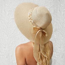 Mujer Paja Color sólido Elegante ala grande Perla Bowknot Visera de borde ondulado Sol Sombrero Playa Sombrero Cubo Somb