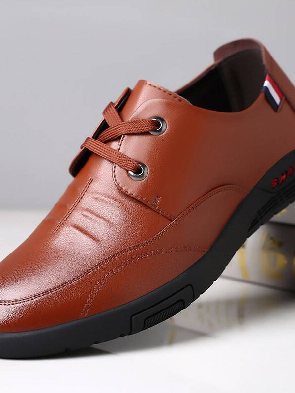 Zapatos planos casuales de negocios antideslizantes de cuero de vaca para hombres