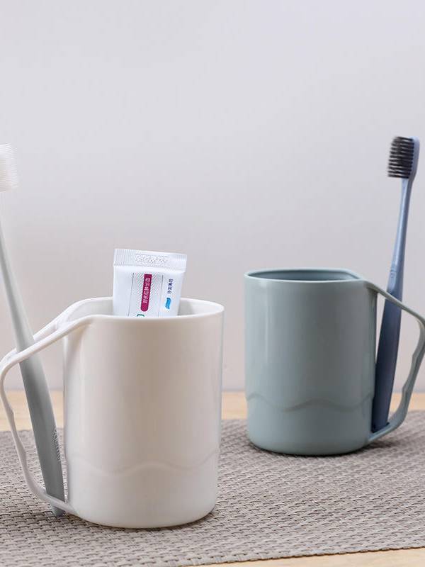 Taza lisa plástica del cepillo de dientes del hogar con la taza del cepillo de dientes de la taza del enjuague bucal par