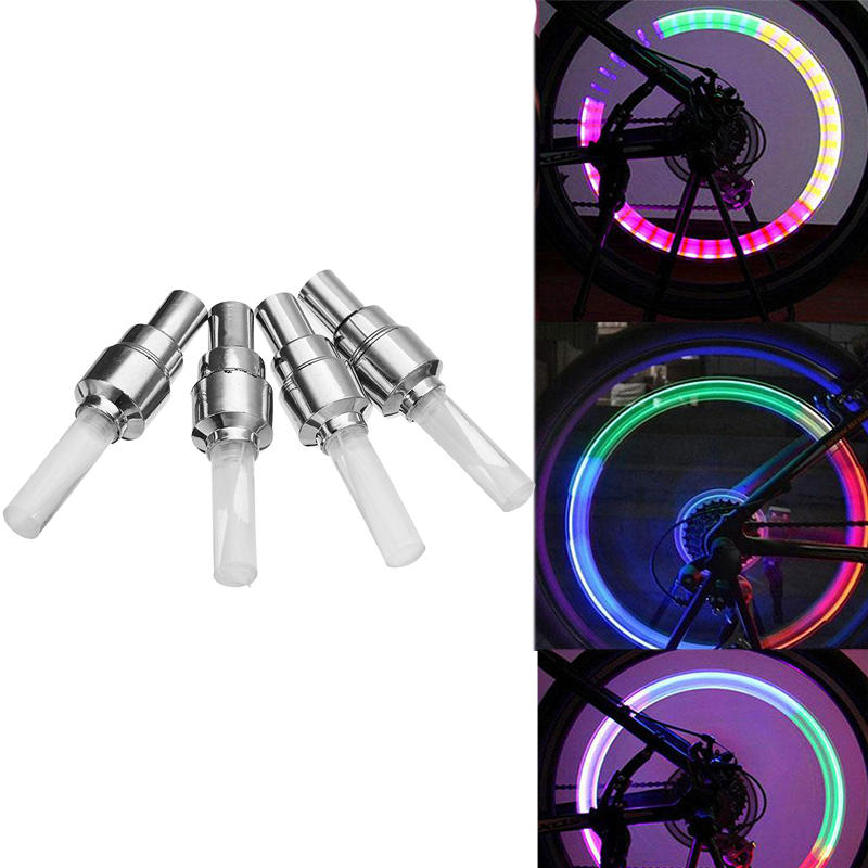 4Pcs XANES WL04 Boquilla de luz de la rueda de la bicicleta de la inducción de la vibración luz del rayo para Schrader V