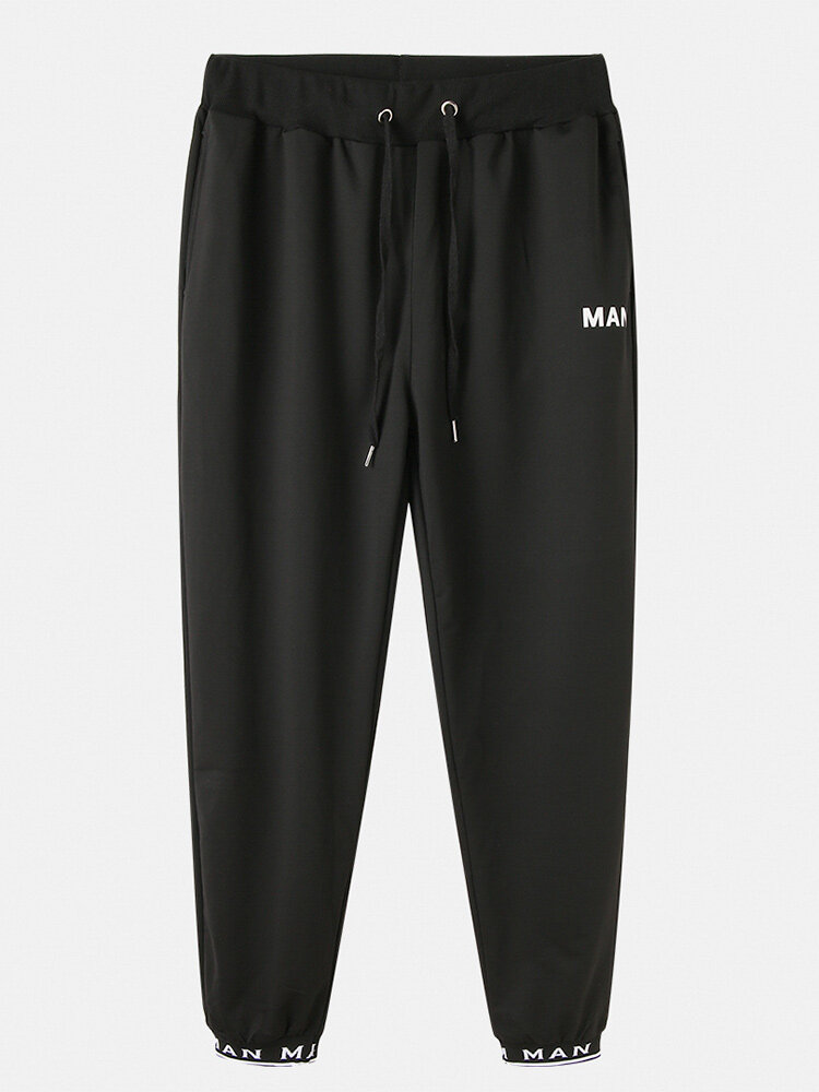Jogger negro deportivo con cordón negro con estampado de letras de algodón para hombre Pantalones con bolsillo