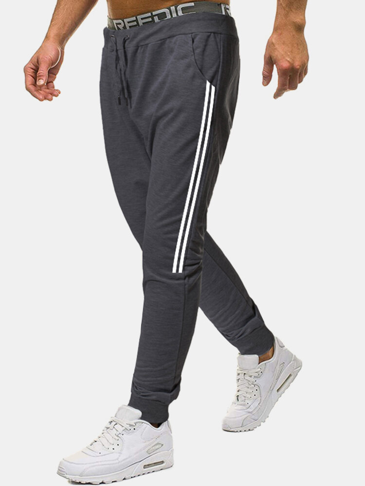 Pantalones de chándal informales deportivos de cintura con cordón de algodón a rayas laterales para hombre Pantalones