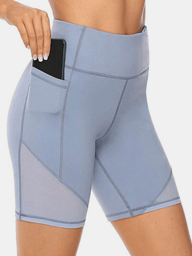 Tallas grandes Mujer Pantalones cortos deportivos de secado rápido con color sólido y bolsillo